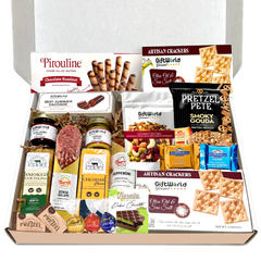 Charcuterie set with meats, cheeses, truffles, and crackers